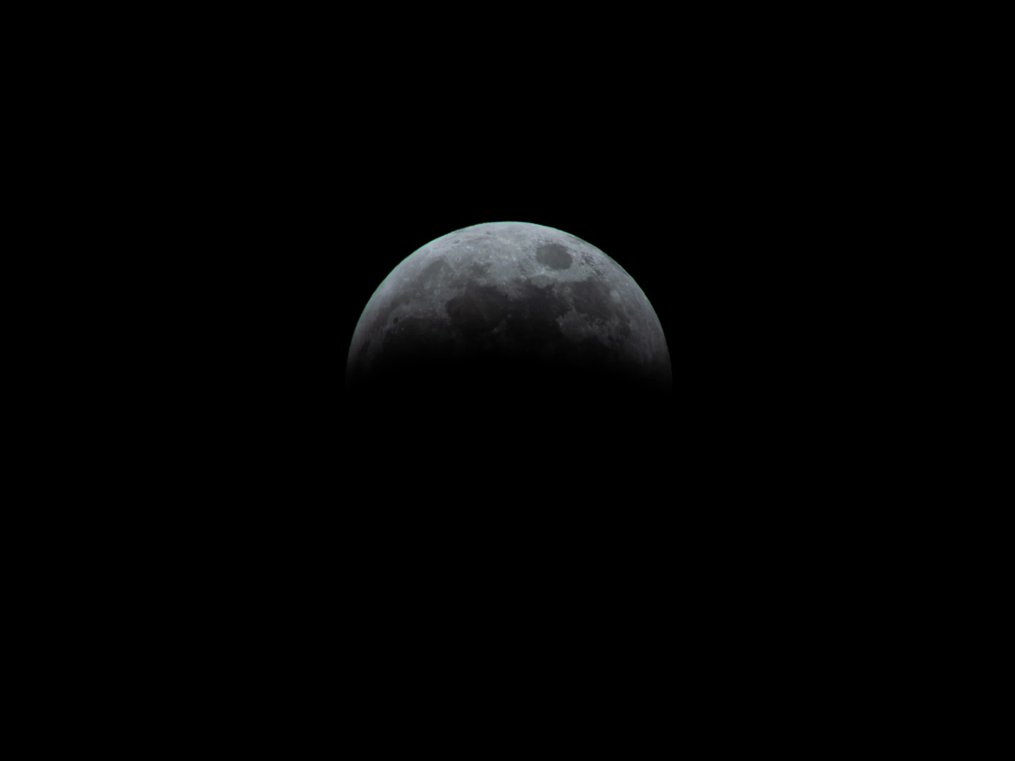 Most of the moon dimmed.