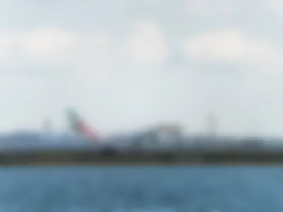 Emirates Boeing B777-31HER (registration number A6-EQG) touching the runway 22L