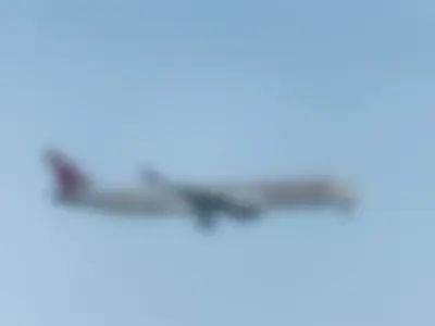 Qatar Airways Airbus A350-941 (registration number A7-AMJ) making final approach to the runway 22L