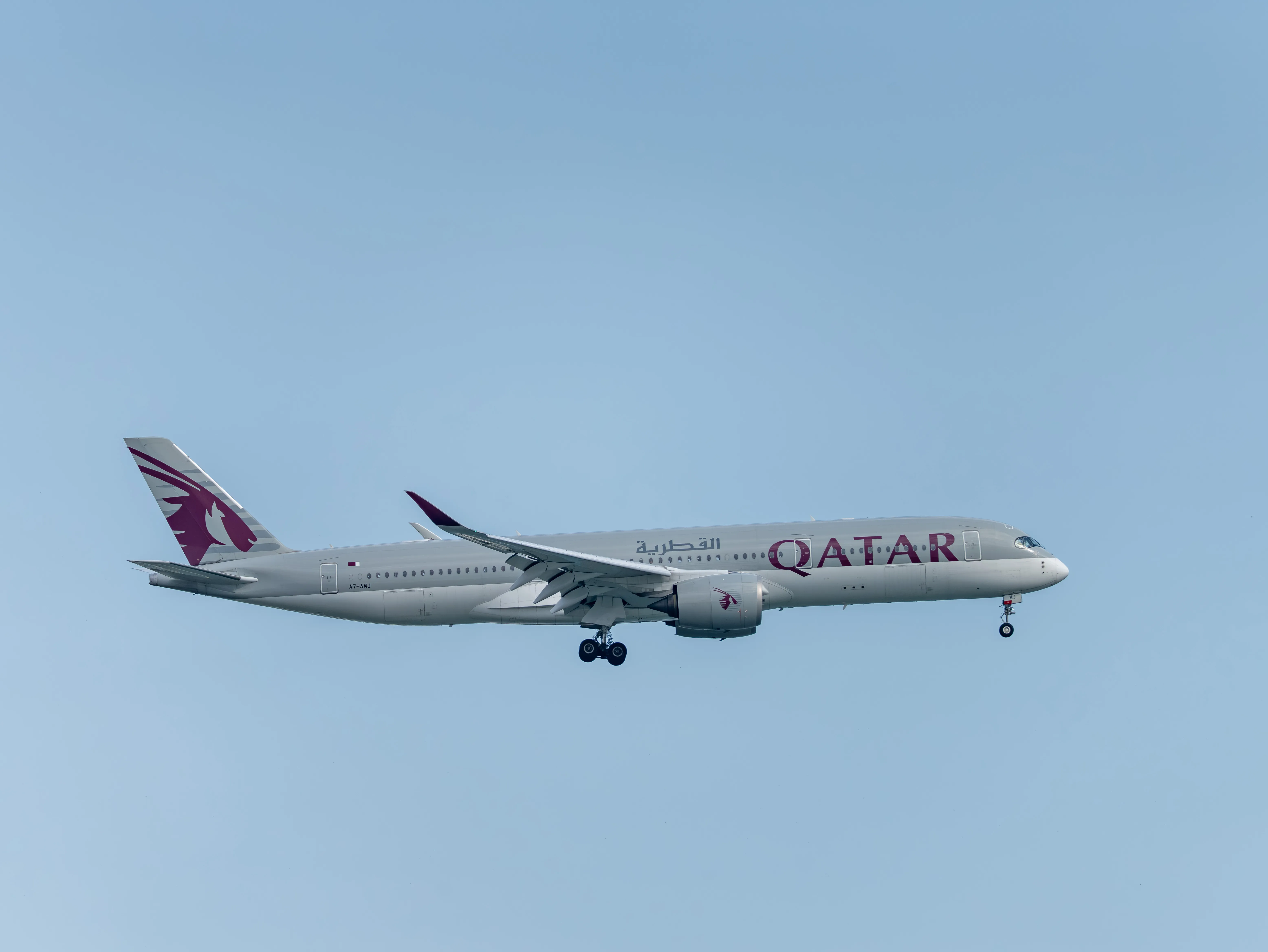 Qatar Airways Airbus A350-941 (registration number A7-AMJ) making final approach to the runway 22L