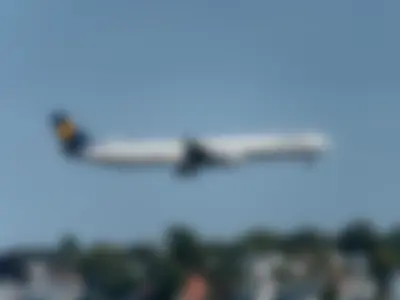 Lufthansa Airbus A340-600 (registration number D-AIHX) is making final approach to the runway 22L