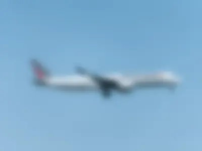 Air France Airbus A350-941 (registration number F-HUVA) making final approach to the runway 22L