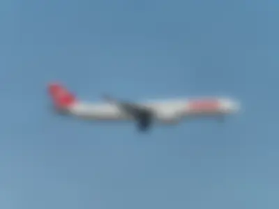 Swiss International Air Lines Airbus A330-343 (registration number HB-JHN) making final approach to the runway 22L