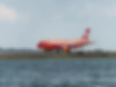 JetBlue Airbus A320-232 (registration number N643JB) in Dunkin’ livery, taxiing on taxiway N