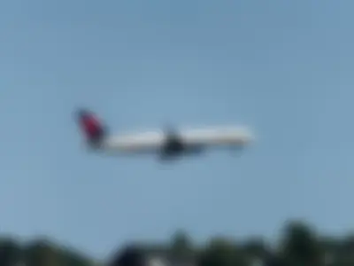 Delta Air Lines Boeing B757-231 (registration number N727TW) making final approach to the runway 22L
