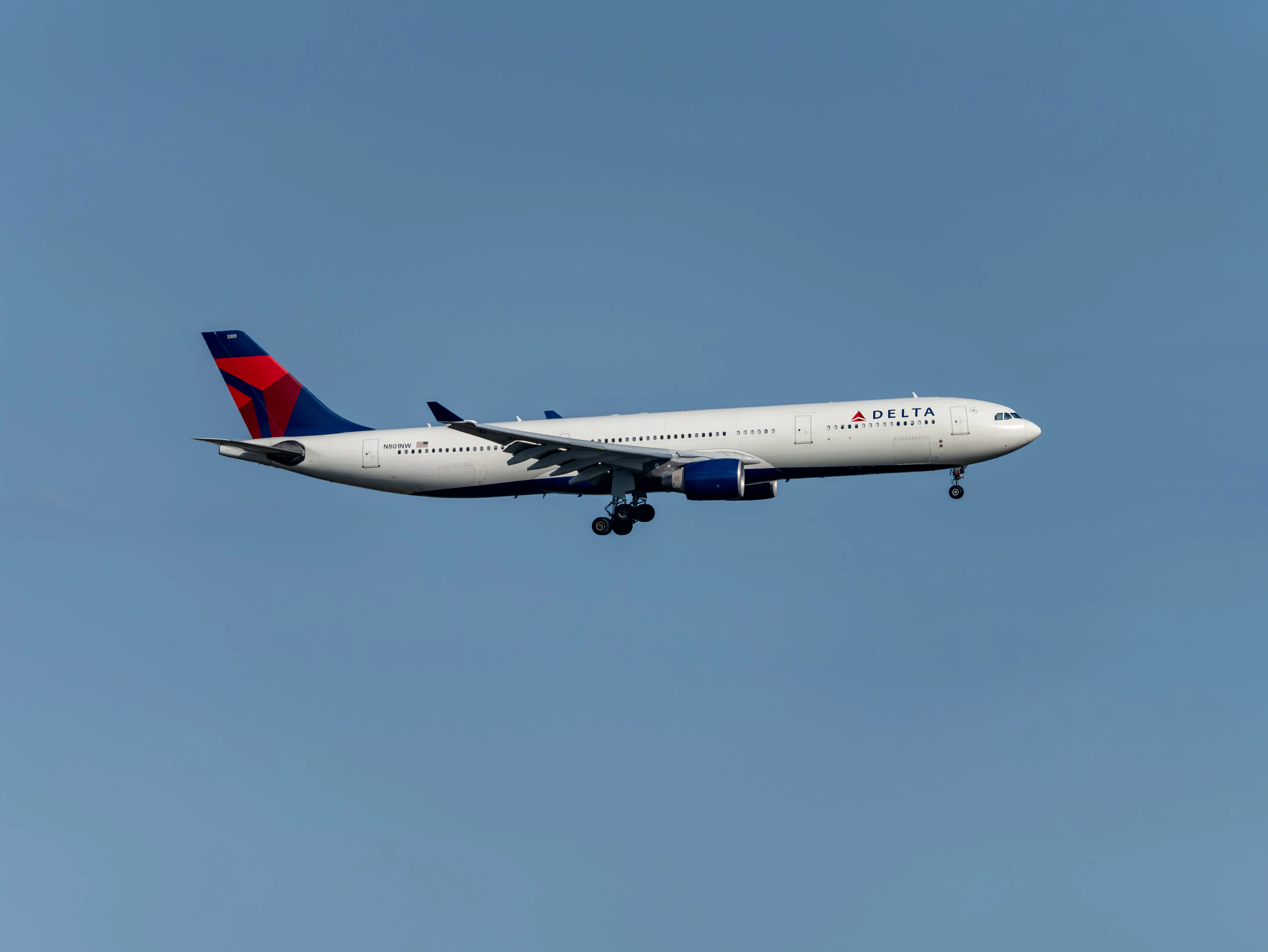 Delta Air Lines Airbus A330-323 (registration number N801NW) making final approach to the runway 22L