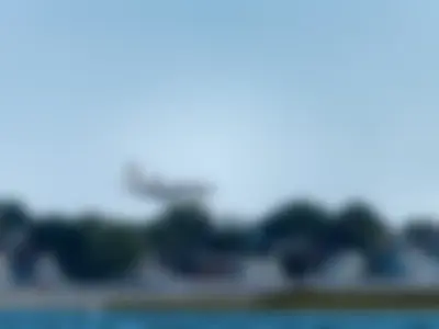 Dassault Falcon 7X (registration number N805CC, private owner) making final approach to the runway 22L