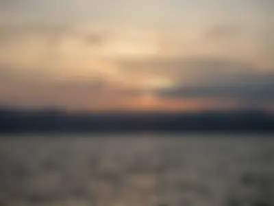 Peaceful sunrise from mountains over Erhai Lake