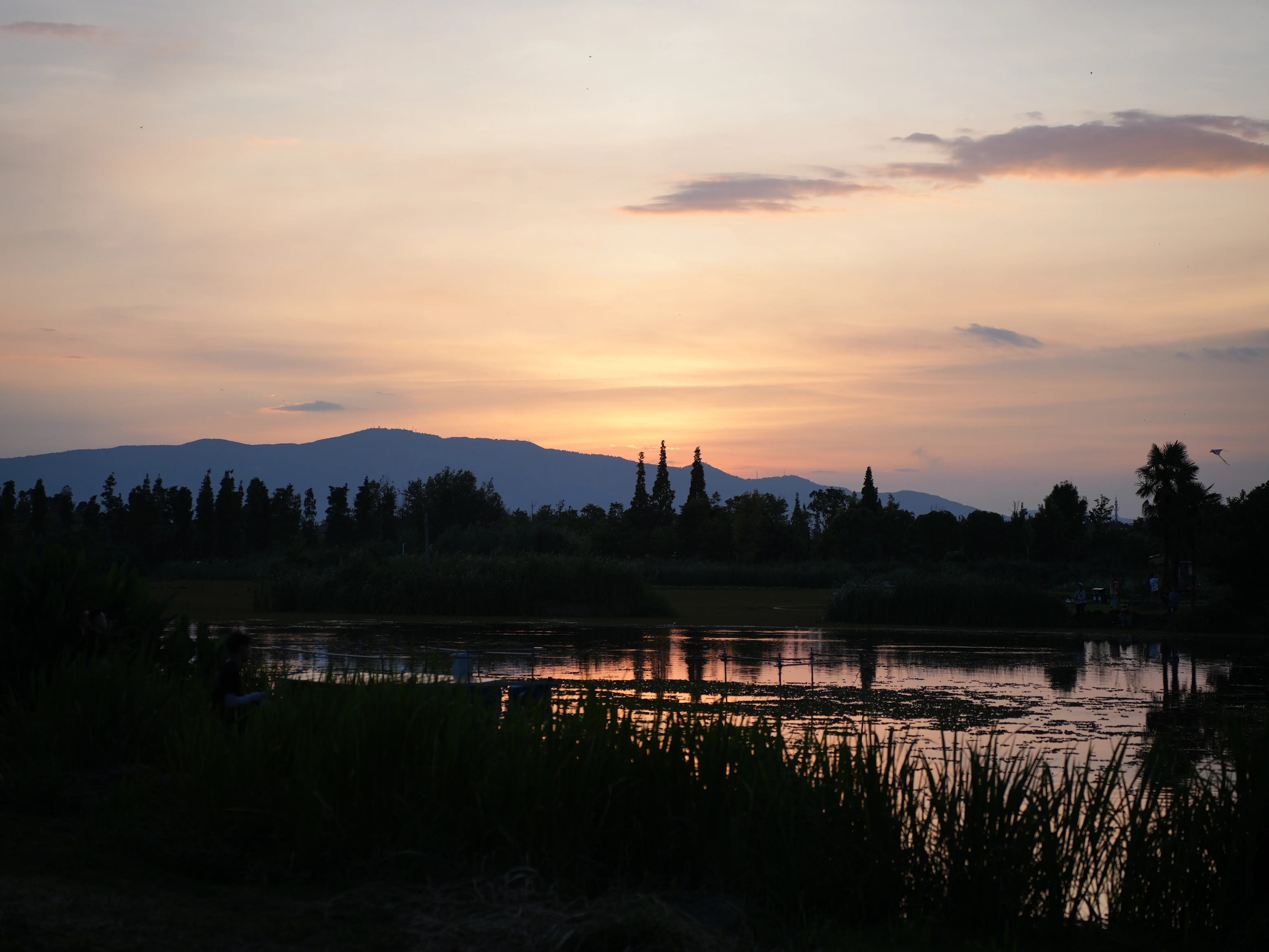 Oil painting-like sky and reflections in the water at sunset