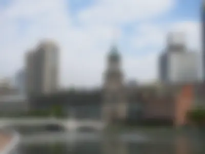 Suzhou Creek, Zhejiang Road Bridge and Shanghai Postal Museum with its name inscribed by JIANG Zeming